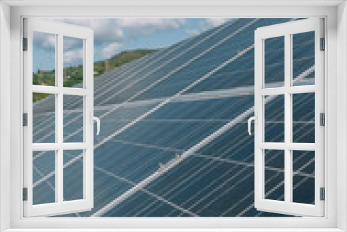 Fototapeta Naklejka Na Ścianę Okno 3D - Paneles solares en techo de nave industrial