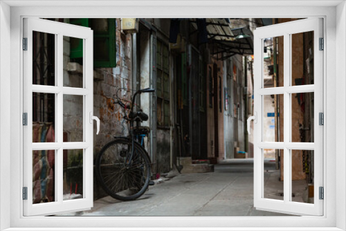 Fototapeta Naklejka Na Ścianę Okno 3D - 中国　広州市の路地裏の街並み