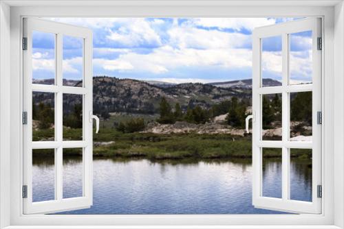 Fototapeta Naklejka Na Ścianę Okno 3D - Beartooth Lake in Rocky Mountains along Beartooth Highway, an All-American Scenic Byway, in June