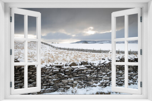 Fototapeta Naklejka Na Ścianę Okno 3D - snow scene in the North Yorkshire Dales showing dry stone walls