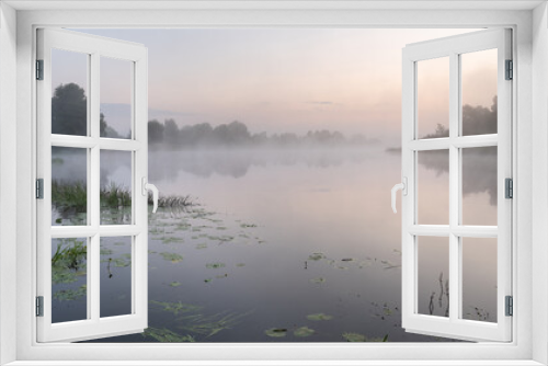 Fototapeta Naklejka Na Ścianę Okno 3D - Tranquil summer landscape at sunrise. Fog on the water surface of a quiet river.  The nature of Belarus.