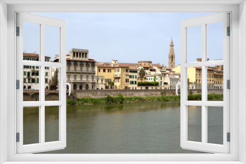 Fototapeta Naklejka Na Ścianę Okno 3D - View of the Arno river and historic buildings