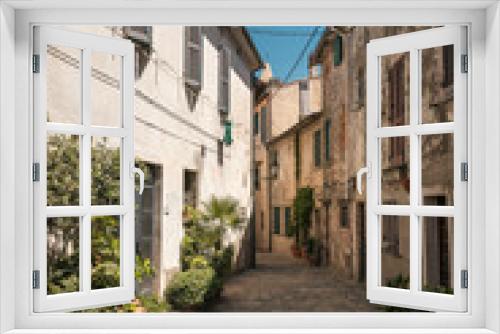 Fototapeta Naklejka Na Ścianę Okno 3D - narrow alley in picturesque tuscan village of Capalbio