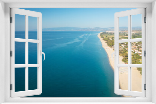 Fototapeta Naklejka Na Ścianę Okno 3D - Aerial view of beautiful sea and beach at sunny day, seascape and hill mountain on backgrond, Simeri Mare, Calabria, Southern Italy