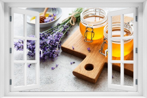 Fototapeta Naklejka Na Ścianę Okno 3D - Jars with honey and fresh lavender flowers
