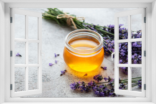 Fototapeta Naklejka Na Ścianę Okno 3D - Jar with honey and fresh lavender flowers