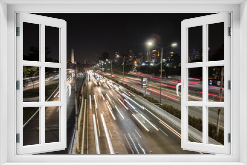 Fototapeta Naklejka Na Ścianę Okno 3D - Traffic on 23 de Maio Avenue, near of Ibirapuera Park, in Sao Paulo