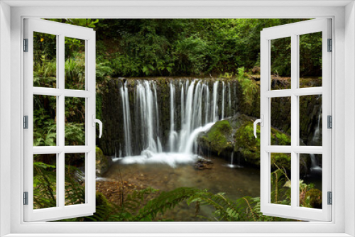 Fototapeta Naklejka Na Ścianę Okno 3D - Beautiful waterfall in a forest in Galicia, Spain, known by the name of San Pedro de Incio.
