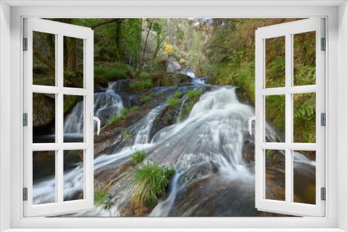 Fototapeta Naklejka Na Ścianę Okno 3D - Waterfall in a beautiful forest in the area of Galicia, Spain.
