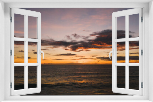 Fototapeta Naklejka Na Ścianę Okno 3D - Amazing Orange color sunset sky and ocean waves crashing on beach.Landscape Aerial view backgrounds