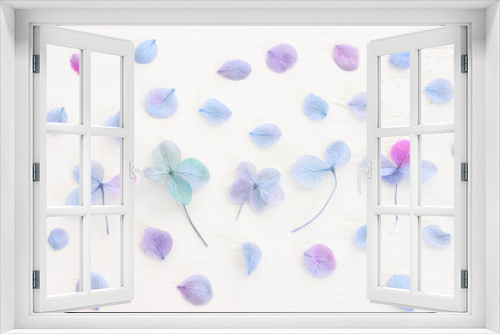Fototapeta Naklejka Na Ścianę Okno 3D - Top view image of Hydrangea flowers composition over white wooden background .Flat lay
