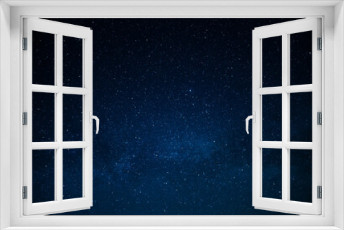 Fototapeta Naklejka Na Ścianę Okno 3D - Dark blue night sky and small twinkling stars. Abstraction. Minimalism. There is no one in the photo. Astrology, Galaxy, Space. Background. Wallpaper. Texture.