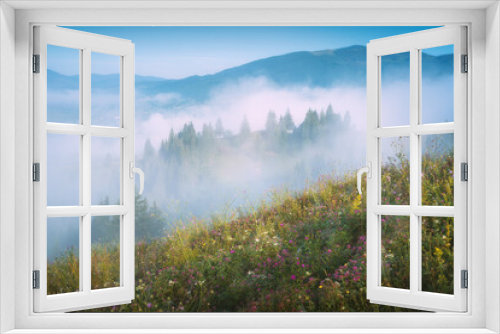 Fototapeta Naklejka Na Ścianę Okno 3D - Grassy hill in a misty mountains