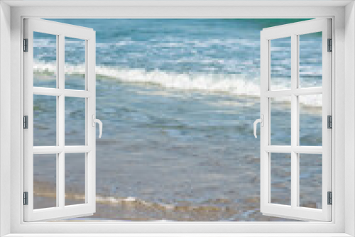 Fototapeta Naklejka Na Ścianę Okno 3D - Sea or ocean tropical landscape view. Sea waves under the sun. Summer vacation and travel concept. Water wave surface. Sand beach. 