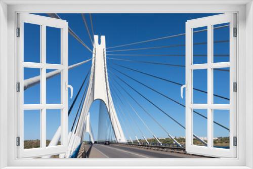 Fototapeta Naklejka Na Ścianę Okno 3D - Suspension bridge and one of the largest suspension bridges in Portugal.
Sunny day, travel concept