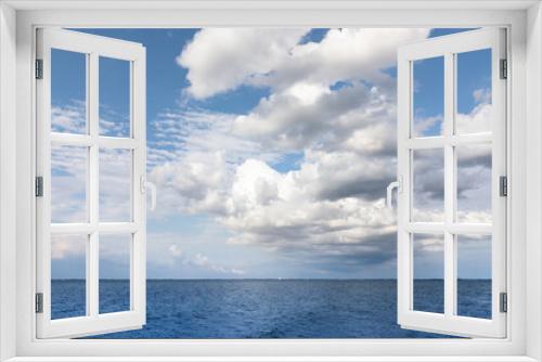 Fototapeta Naklejka Na Ścianę Okno 3D - Sea and blue sky with clouds