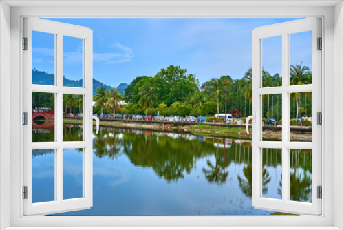 Fototapeta Naklejka Na Ścianę Okno 3D - Pond in green park on tropical island. Beautiful nature scenery, place to mind rest