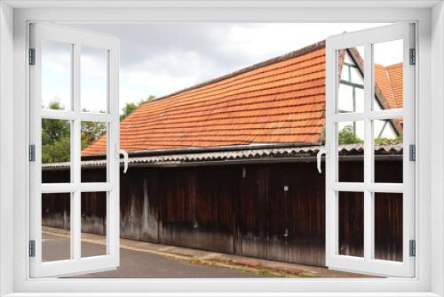 Fototapeta Naklejka Na Ścianę Okno 3D - Garagentore aus Holz. Garagen.