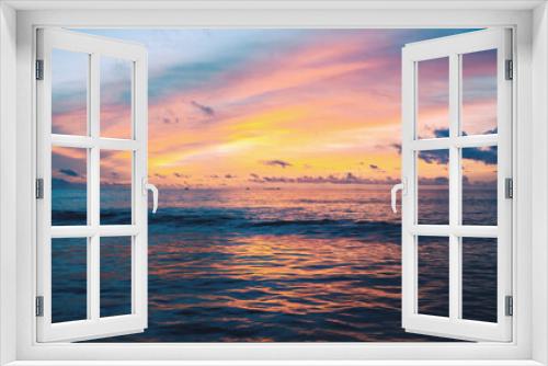 Fototapeta Naklejka Na Ścianę Okno 3D - The landscape of a beautiful colored sunset in the Indian Ocean.