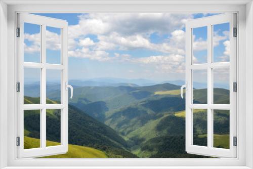 Fototapeta Naklejka Na Ścianę Okno 3D - A wonderful summer view of the Carpathian mountain slopes, densely covered with green forest. Borzhava ridge, Transcarpathia, Ukraine