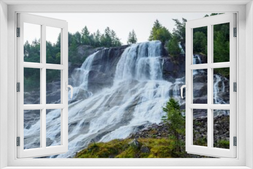 Fototapeta Naklejka Na Ścianę Okno 3D - Furebergfossen waterfall near Rosendal, Norway.