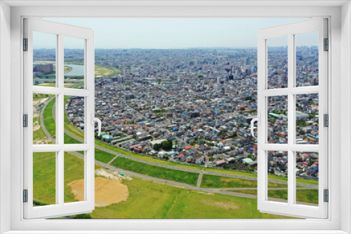 Fototapeta Naklejka Na Ścianę Okno 3D - 江戸川上空から空撮した東京の下町