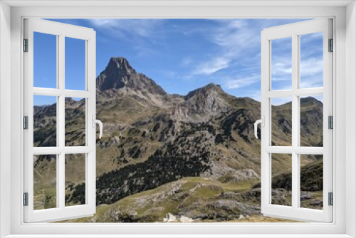 Fototapeta Naklejka Na Ścianę Okno 3D - View of a mountain landscape with a cloudy sky. Pic du Midi d'Ossau