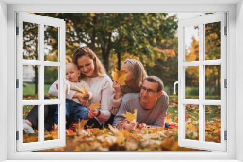 happy family on autumn picnic in park