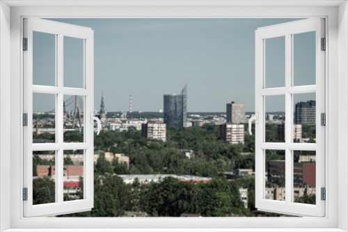 Fototapeta Naklejka Na Ścianę Okno 3D - Summer cityscape of Riga. Top view. Modern urban architecture.