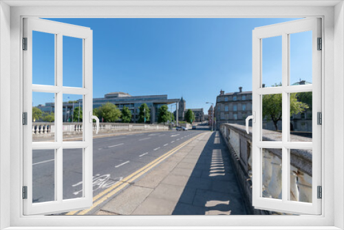 Fototapeta Naklejka Na Ścianę Okno 3D - View to Dublin city council building and Christ Church Cathedral from O'Donnovan Rossa Bridge.