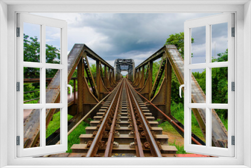 Fototapeta Naklejka Na Ścianę Okno 3D - Old Metal rail way road bridge.