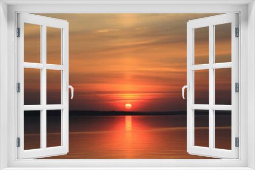 Fototapeta Naklejka Na Ścianę Okno 3D - sunset over lake water surface