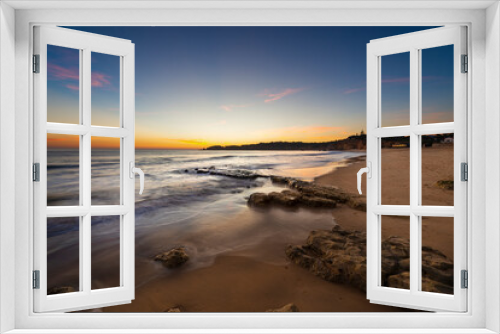Fototapeta Naklejka Na Ścianę Okno 3D - Scenic view of the Vau Beach (Praia do Vau) at sunset, in Portimao, Algarve, Portugal; Concept for summer beach vacations and travel in Portugal
