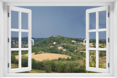 Fototapeta Naklejka Na Ścianę Okno 3D - The view of a hilly landscape typical of the Tuscan countryside (Tuscany, Italy, Europe)