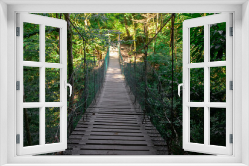 Fototapeta Naklejka Na Ścianę Okno 3D - wooden suspension bridge in the forest, jungle