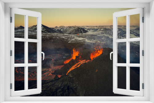 Fototapeta Naklejka Na Ścianę Okno 3D - Scenic view of volcano erupting at sunset