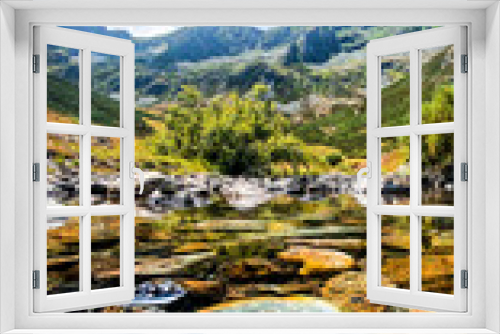 Fototapeta Naklejka Na Ścianę Okno 3D - Stunning water reflection with mountains in the background and vivid colors