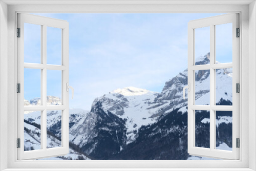 Fototapeta Naklejka Na Ścianę Okno 3D - beautiful winter landscape, snow-covered trees, mountainpass, snowfall in the mountains, Swiss Alps in the snow, walks in the winter white forest, tourism, winter sports