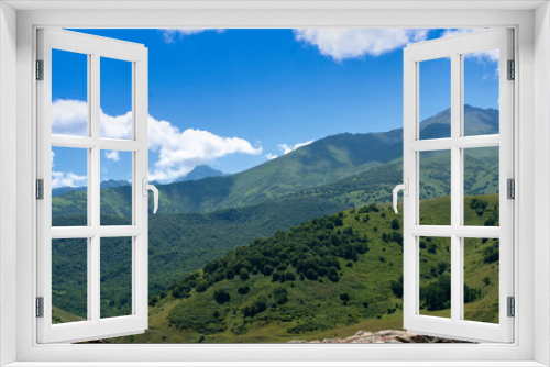 Fototapeta Naklejka Na Ścianę Okno 3D - Mountains of North Ossetia, beautiful summer landscapes with blue sky and clouds.
