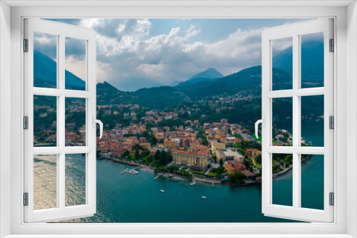 Fototapeta Naklejka Na Ścianę Okno 3D - Aerial view of Menaggio village on a cloudy day. Menaggio is a picturesque and traditional village, located on the western shore of Lake Como, Italy