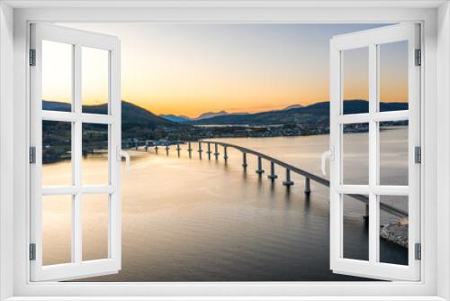 Fototapeta Naklejka Na Ścianę Okno 3D - A Box Girder Bridge Crossing a Fjord in Norway at Sunset