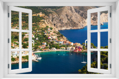 Fototapeta Naklejka Na Ścianę Okno 3D - Top view at Asos village, Assos peninsula and fantastic blue Ionian Sea water. Aerial view, summer scenery of famous and extremely popular travel destination in Cephalonia, Greece, Europe.
