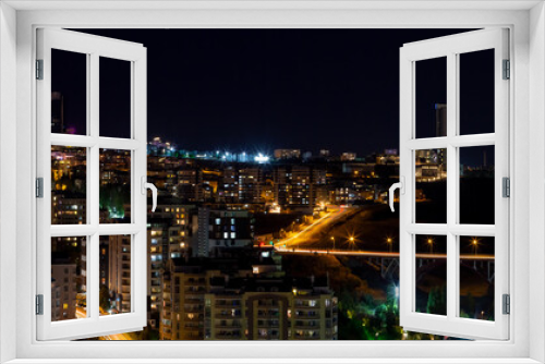 Fototapeta Naklejka Na Ścianę Okno 3D - Beautiful panoramic cityscape of Cankaya, Oran and Dikmen districts in Ankara at night. Long exposure photography of Dikmen Valley Bridge and surrounding buildings.