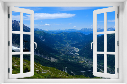 Fototapeta Naklejka Na Ścianę Okno 3D - Amazing landscape with Chamonix Valley and cable car coach going to the Aiguille du Midi 3842 m mountain in the Mont Blanc massif , Chamonix, French Alps, Haute Savoie, France