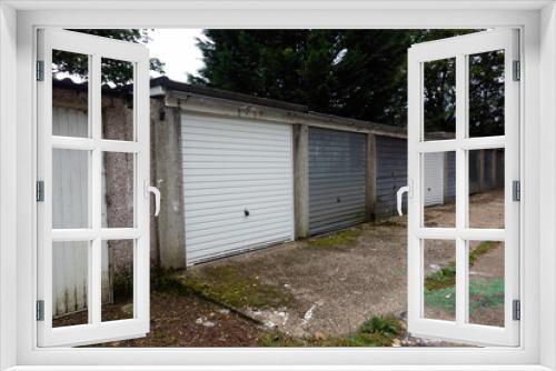 Fototapeta Naklejka Na Ścianę Okno 3D - Collection of Block of Garages Council Owned in England