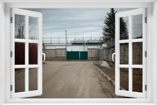 Fototapeta Naklejka Na Ścianę Okno 3D - The gate of entry into the industrial zone.