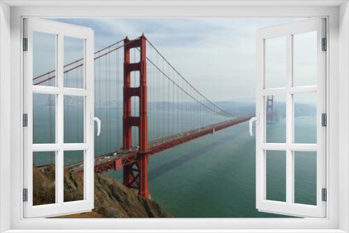 Fototapeta Naklejka Na Ścianę Okno 3D - Golden Gate Bridge in mist, famous landmark and popular tourist spot near San Francisco, California, United States