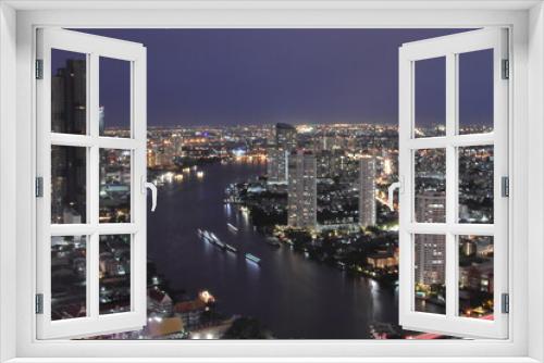 Fototapeta Naklejka Na Ścianę Okno 3D - The Cityscape, the Skyscraper and the Chao Phraya River of Bangkok Thailand in the Night