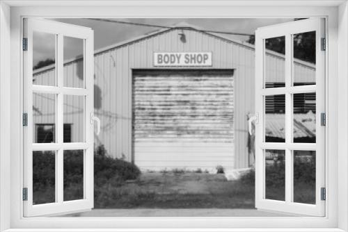 Fototapeta Naklejka Na Ścianę Okno 3D - Houston Downtown body shop