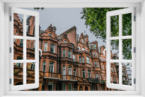 Fototapeta Naklejka Na Ścianę Okno 3D - Facade of English Victorian Style terraced Townhouses in Chelsea London